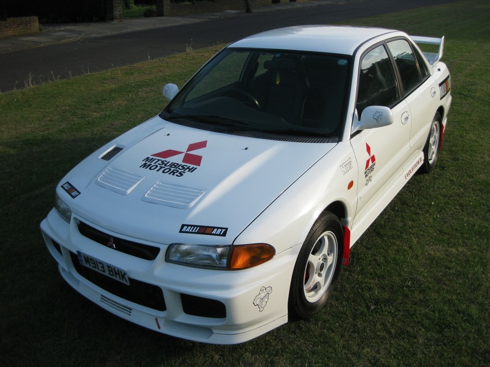 + 2 LARGE ORIGINAL GENUINE MITSUBISHI STICKERS EVO, PERMANENT WHITE