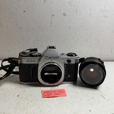 Canon AE-1 Black 35mm SLR Film Camera with Canon FD 50mm f/1.8 Prime Lens