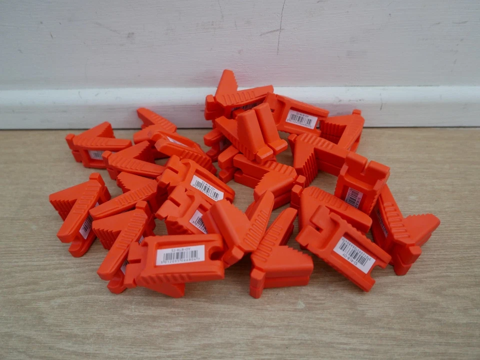 12 PAIRS OF ORANGE SPEAR & JACKSON RUBBER CORNER LINE BLOCKS SJ RLB OY