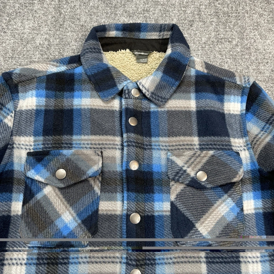 Chaqueta de franela forrada Eddie Bauer Sherpa para niños 10-12 frente a presión azul a cuadros Foto 2 de 4