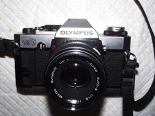 OLYMPUS OM-G 35MM FILM CAMERA W ZUIKO 50MM F1.8  VIVITAR 85-205MM F3.8 LENSES