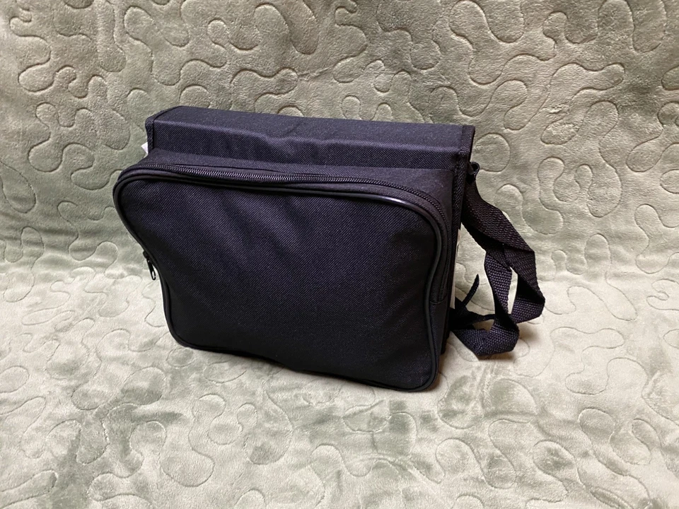 "Kit de reproductor de DVD portátil giratorio Audiovox 2012 de 9"" con 2 auriculares, cables, bolsa, nuevo en caja" Foto 4 de 4