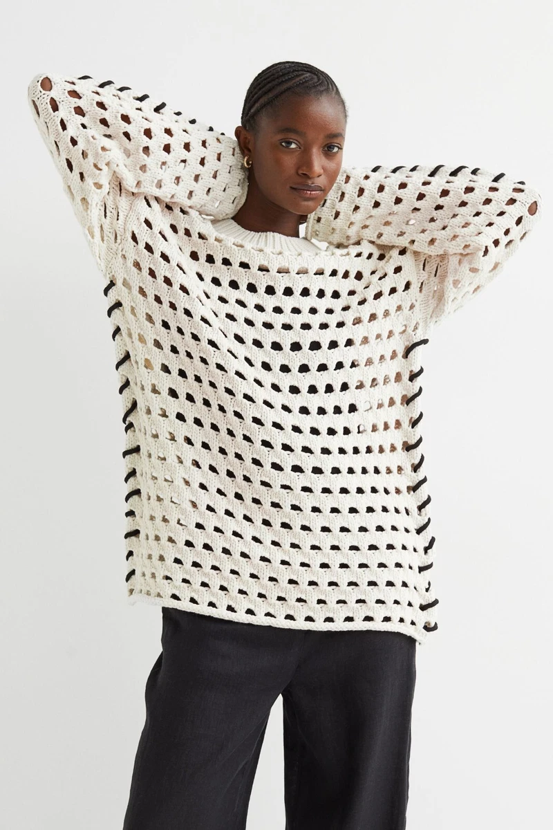 Jumper with holes in sleeves sale