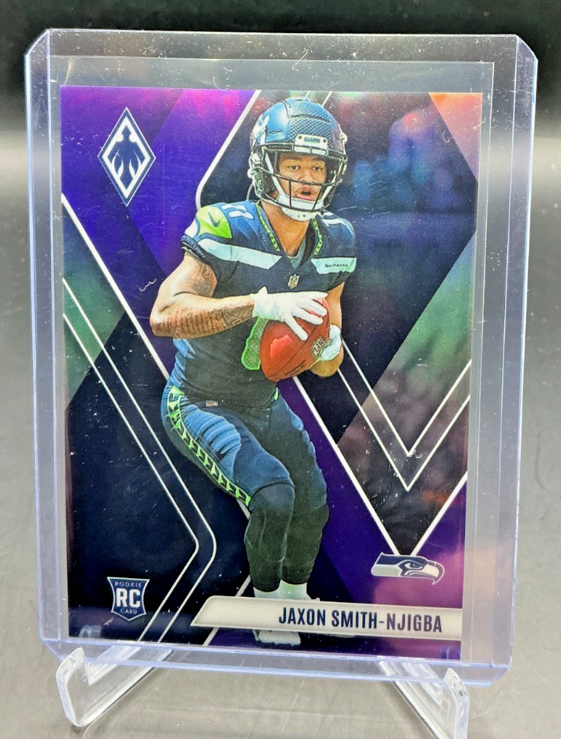 2023 Panini Phoenix JAXON SMITH-NGJIBA RC Purple Prizm 62/125 #106 Seahawks