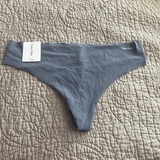 CALVIN KLEIN SEAMLESS THONG SIZE M MINK GREY COLOR NYLON/ELASTANE