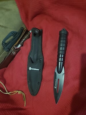 Smith N Wesson Spear Point.  Unused