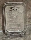 Scottsdale Mint 999 fine Silver in God we Trust lion head capsulated