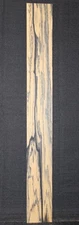 Pale moon, black and white ebony guitar fingerboard blank.  25 inches long