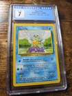 Pokemon Squirtle Base Set Unlimited 63/102 CGC 7