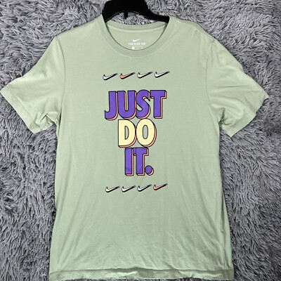 green and purple nike shirt