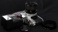 Canon AE-1 35mm Film SLR c/w FD 50mm f/3.5 Macro Lens Sunpak Auto 24 DX Kit