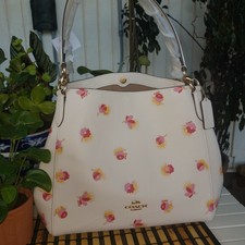 hallie shoulder bolsa in signature canvas red