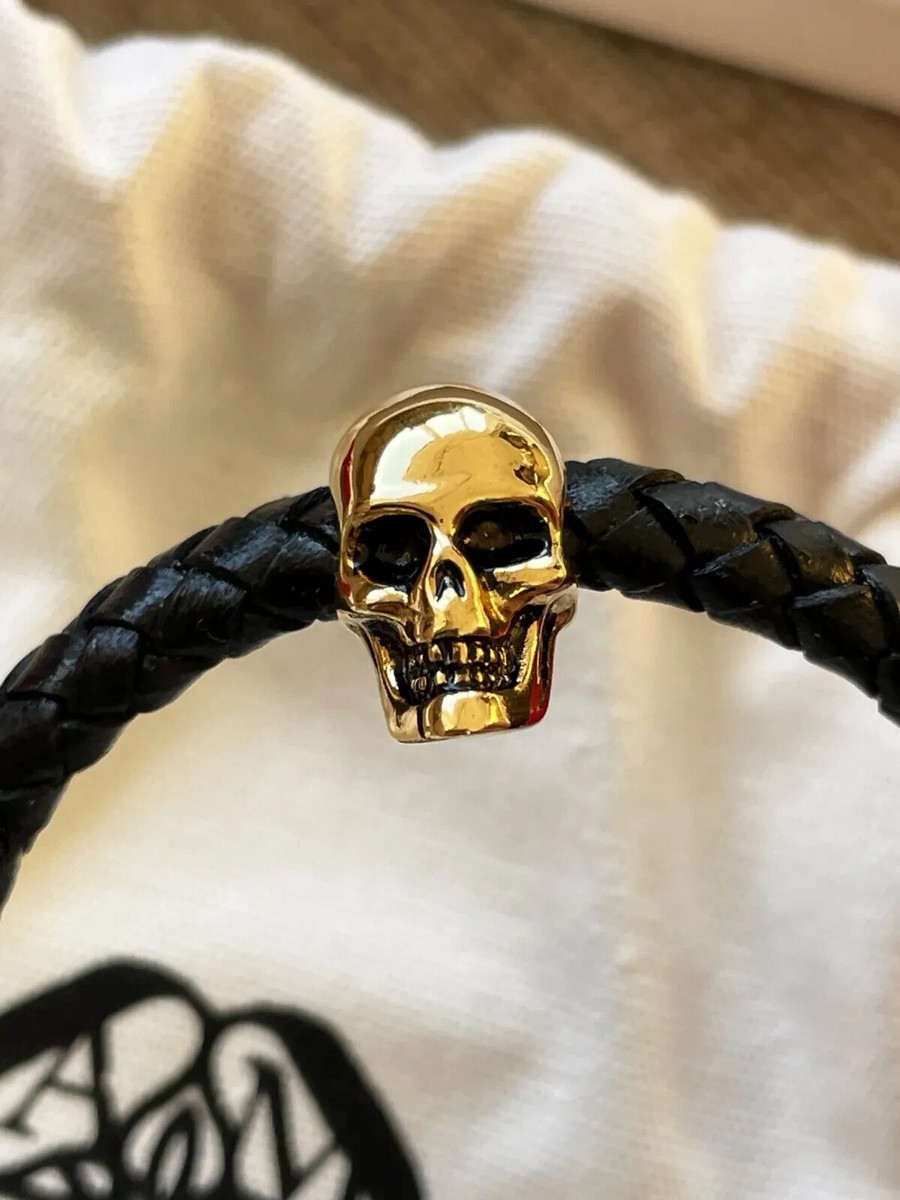 アクセサリーその他 MCQUEEN Braided bracelet ALEXANDER McQUEEN 'Skull Braided Leather Bracelet' Blk/Gold