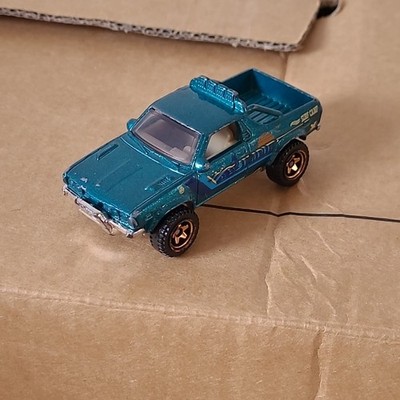 Hot Wheels Subaru BRAT - Teal Surf Camp - HW Off-Road 2014 - 1:64 Modellauto