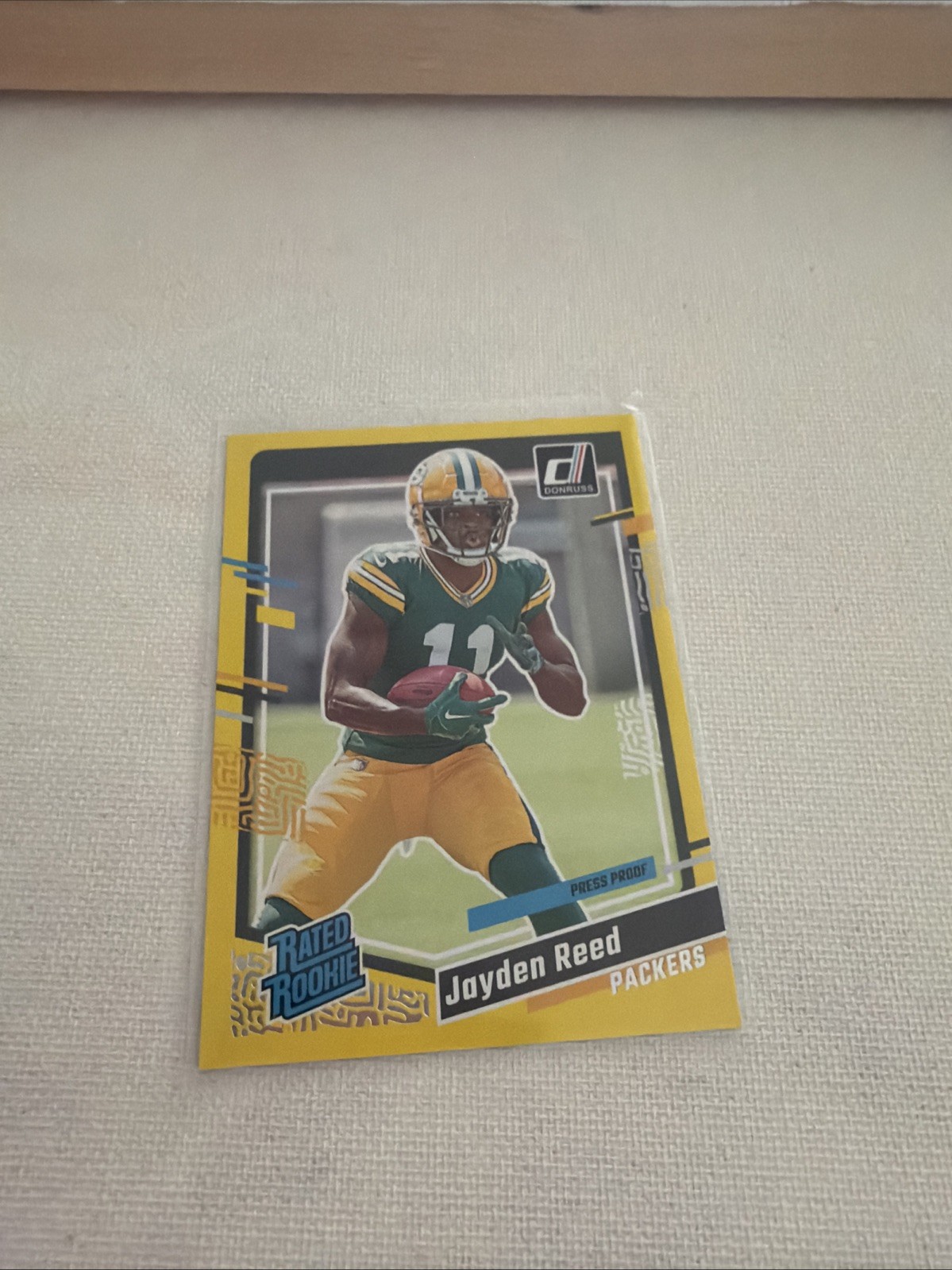 2023 Donruss #334 Jayden Reed Rookie Press Proof Yellow