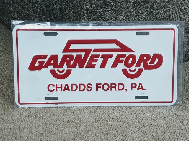 Garnet Volkswagen Chadds Ford Pa Vintage embossed Metal Dealer License Plate GARNET FORD CHADDS FORD PA