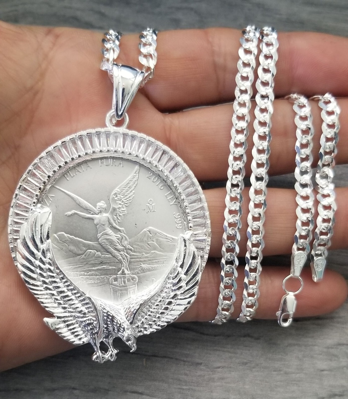 cadena bizel con zirconia y mone.da de 1 oz plata 925 MX 79g 24 