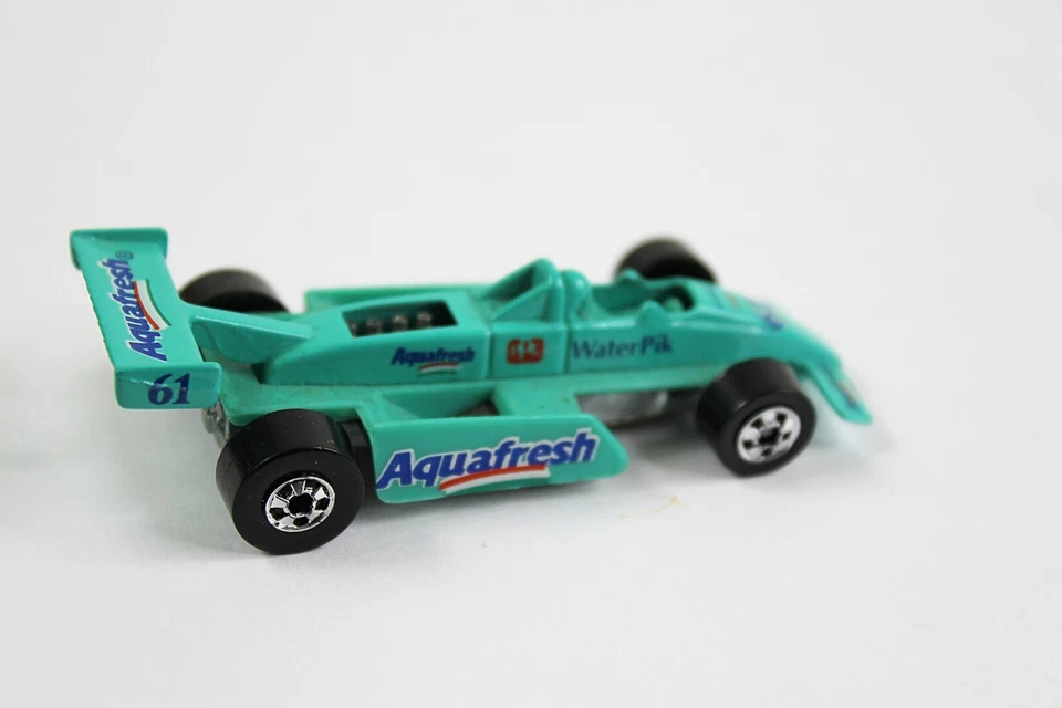 Coche de carreras Aquafresh azul verde Hot Wheels escala 1:64 1982 Foto 2 de 3