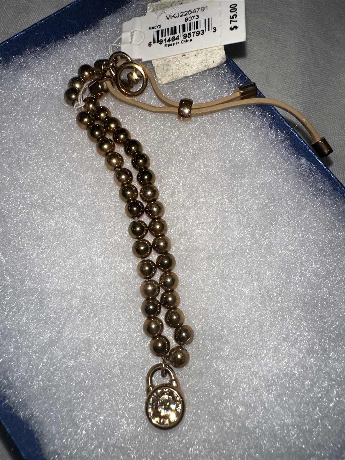 Bracciale regolabile Michael Kors con ciondolo nuovo con etichette colore splendido