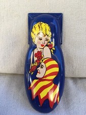 Vtg 50s Kirchhof Tin Litho clicker Noise Maker noisemaker lady man New Years