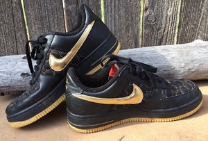 black and metallic gold air force 1