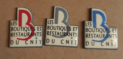 Konvolut 3 Pins Geschäfte und Restaurants des CNIT (3 verschiedene Farben)