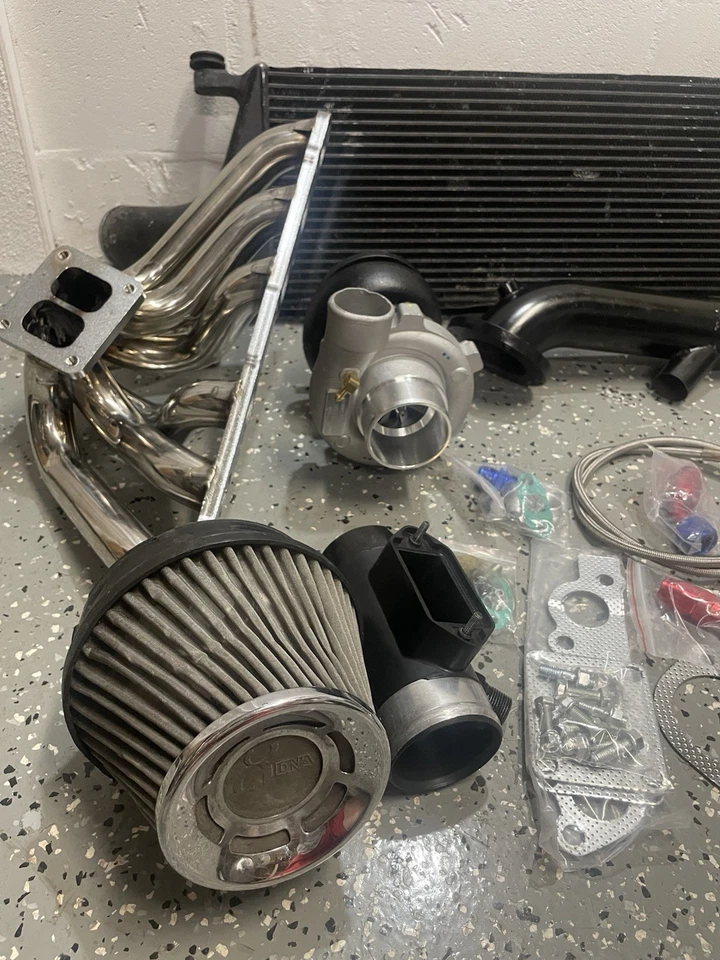 KIT TURBO CARGADOR COLECTOR MONTAJE SUPERIOR SE ADAPTA A IS300 SC300 SUPRA MK4 2JZGE T4 T04E Foto 2 de 4
