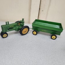 Vintage 1948 John Deere Model A tractor with matching wagon