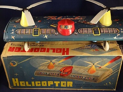 Hélicoptère mécanique à clé avec sa boîte origine Jouet