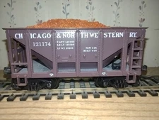 Pair of MDC roundhouse ore cars used