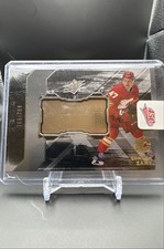 2023-24 SPx - Finite Rookies Connor Zary Flames Rookie /799 (RC)
