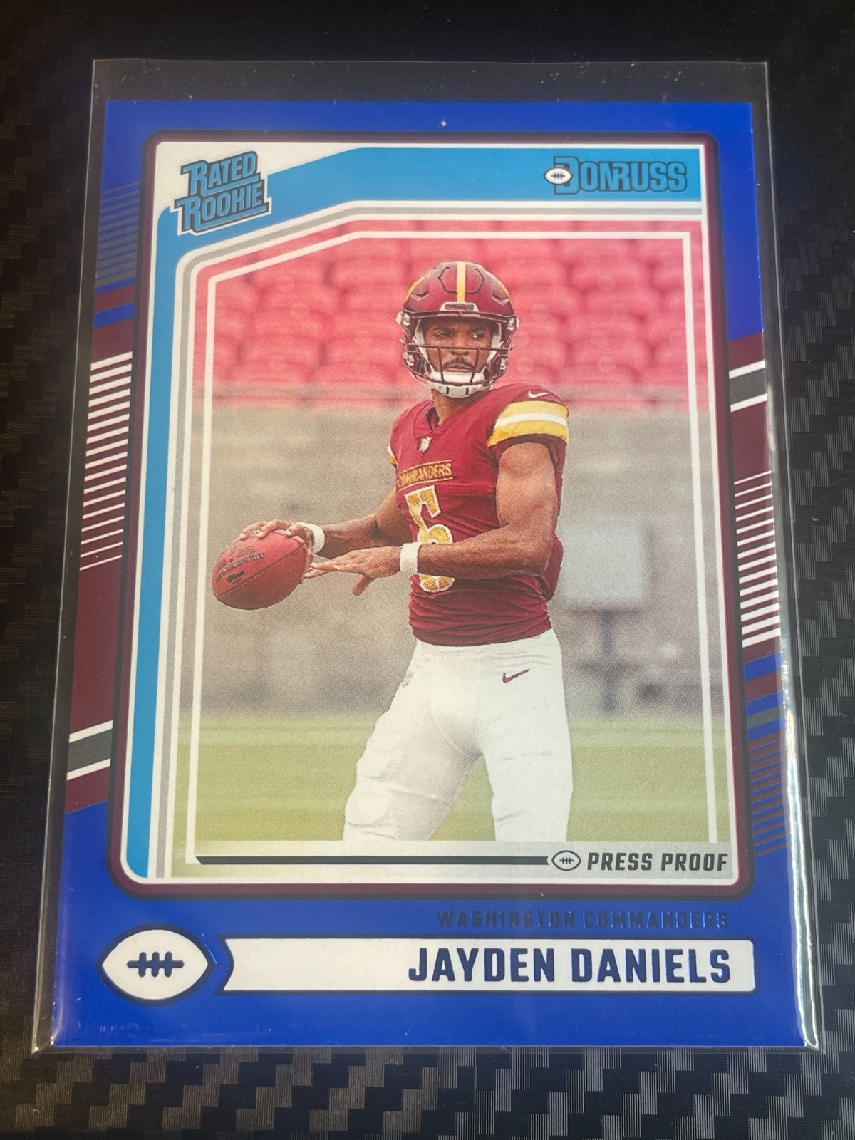 2024 Panini Donruss Jayden Daniels Blue Press Proof RC #389 Commanders