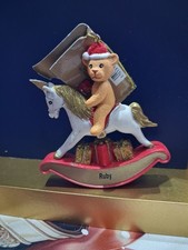 ' Ruby' Small Festive Hanging Decoration Of A Teddy On A Rockinghorse.