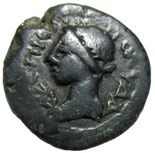 AIOLIS, MYRINA. AE 16. MAGISTRATE POLIDA. C. 2ND CENTURY AD. APOLLO/LYRE.