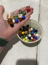 cup of vintage marbles 40 plus vintage dice