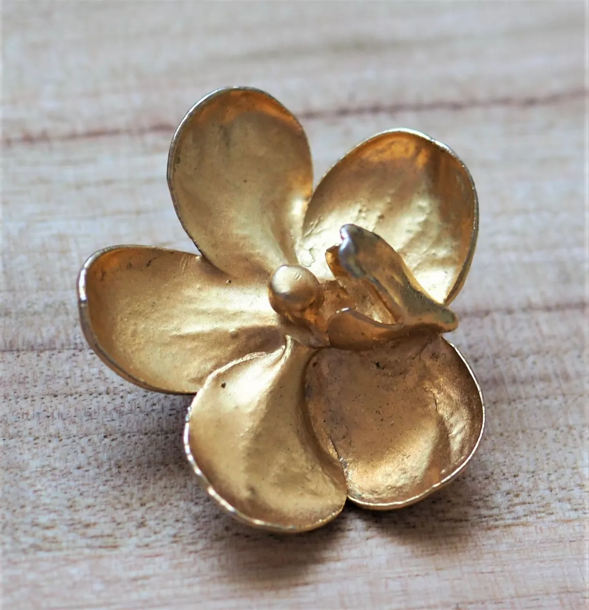Gold plated best sale brooch