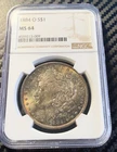 1884 O Morgan silver dollar PCGS MS64 Gold & Rainbow Toned Obverse & Reverse