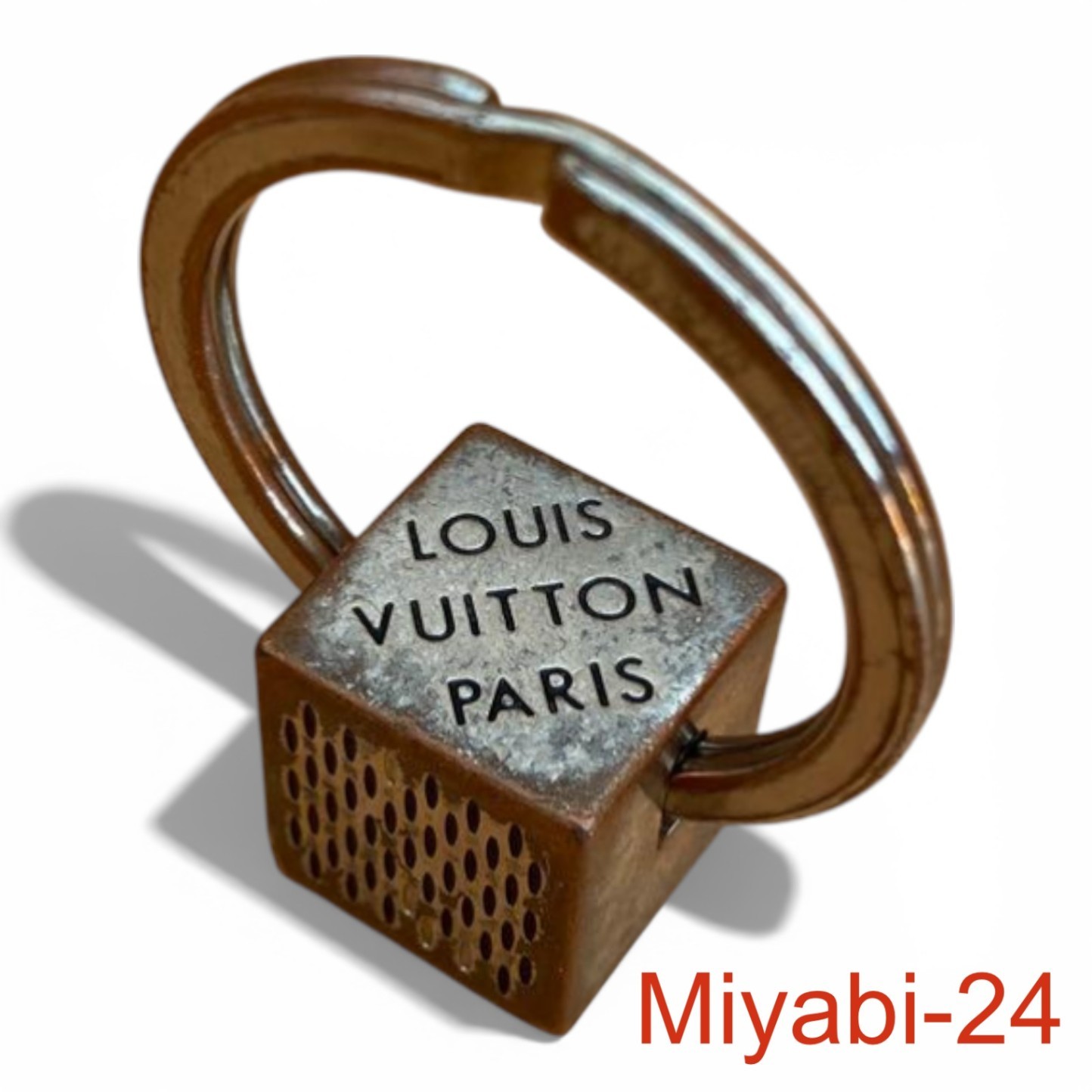 Louis Vuitton Bronze Keyring Used, Scratched, No Box