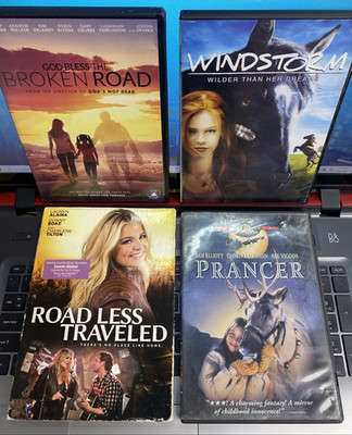 LOT OF 4 DVDS: GOD BLESS BROKEN ROAD, WINDSTORM, ROAD LESS TRAVELED & PRANCER