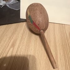 Handmade Wooden Maraca with Painted Red, Green, and Yellow Design