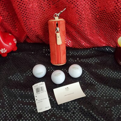 Coach NY 3 Branded Golf Ball Set with Orange & Tan Carrying Case