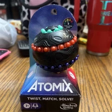 Atomix Spherical Brain Teaser Game Twist Match and Solve Puzzle Fun