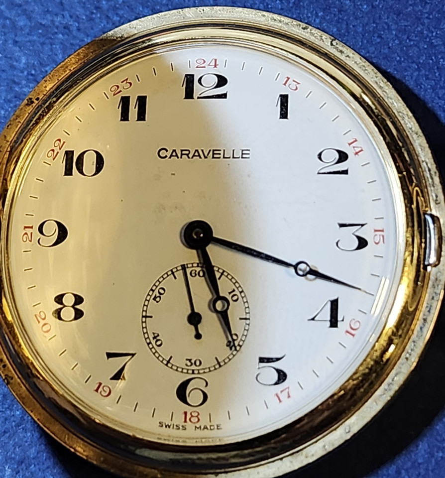 A full hunter Caravelle by Bulova 17-jewel pocket watch — the hinged cover and Bulova pedigree make this a legitimately giftable heirloom-style piece.