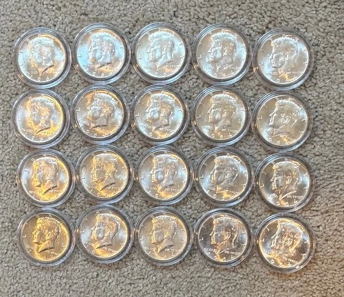 Not 1, but 2 BU Rolls - 40, 1964 Kennedy Half Dollars