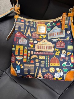 Pre owned Disney Dooney & Bourke 2015 EPCOT Food & Wine Festival Letter Carrier