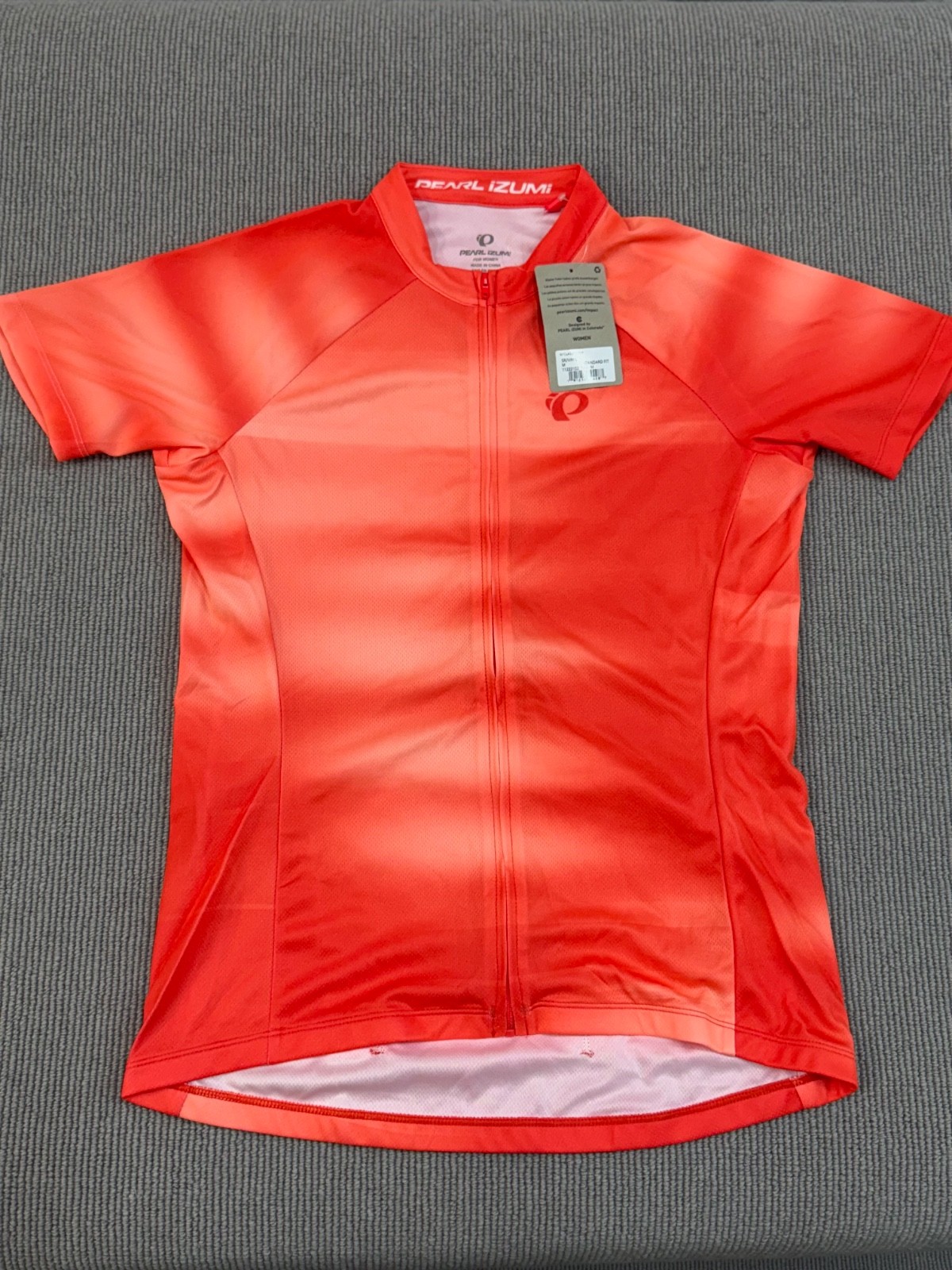 Camiseta deportiva de ciclismo Pearl Izumi mediana NUEVA con etiquetas Top de bicicleta rendimiento transpirable