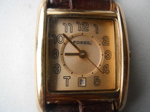 brown leather band,quartz,battery 