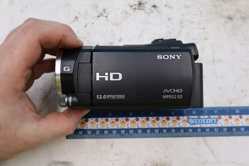 Sony HXR-MC50U for parts/repair. has power but screen doesnt turn on. NO RETURNS