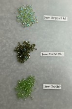 SWAROVSKI  5301 BICONE BEADS 3mm Peridot, Olivine AB, Chrysolite AB -144 ea.