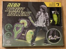Green NEON STREET ROLLERS - LIGHT UP WHEELS - FITS SHOE - NEW IN BOX